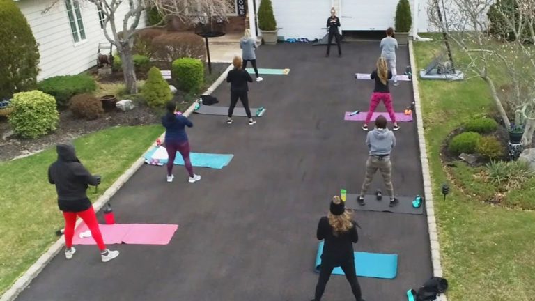 Fitness Instructor Keeps Class Going From Her Driveway